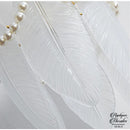 Applique mural suspendu