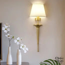 Applique murale dorée