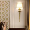 Applique murale dorée