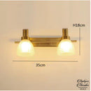 Applique murale dorée salle de bain