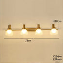 Applique murale dorée salle de bain