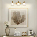 Applique murale dorée salle de bain