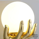 Applique murale main avec boule