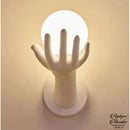 Applique murale main avec boule