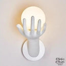 Applique murale main avec boule