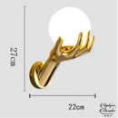 Applique murale main avec boule