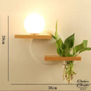 Applique murale vase