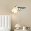 Appliques murales bras articulés