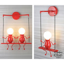 Applique murale bonhomme balancoire