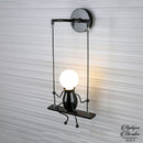 Applique murale bonhomme balancoire